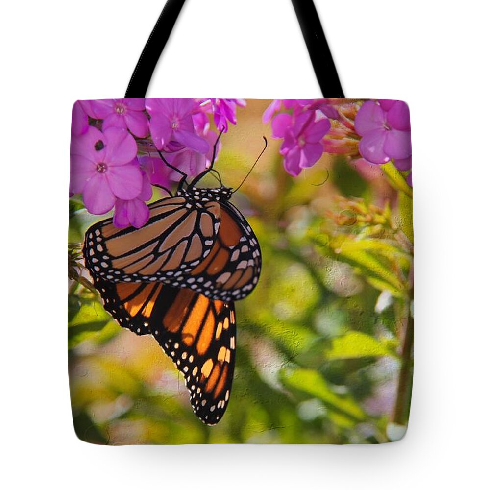 Monarch Tote Bag featuring the photograph Dangling Monarch  by Yumi Johnson