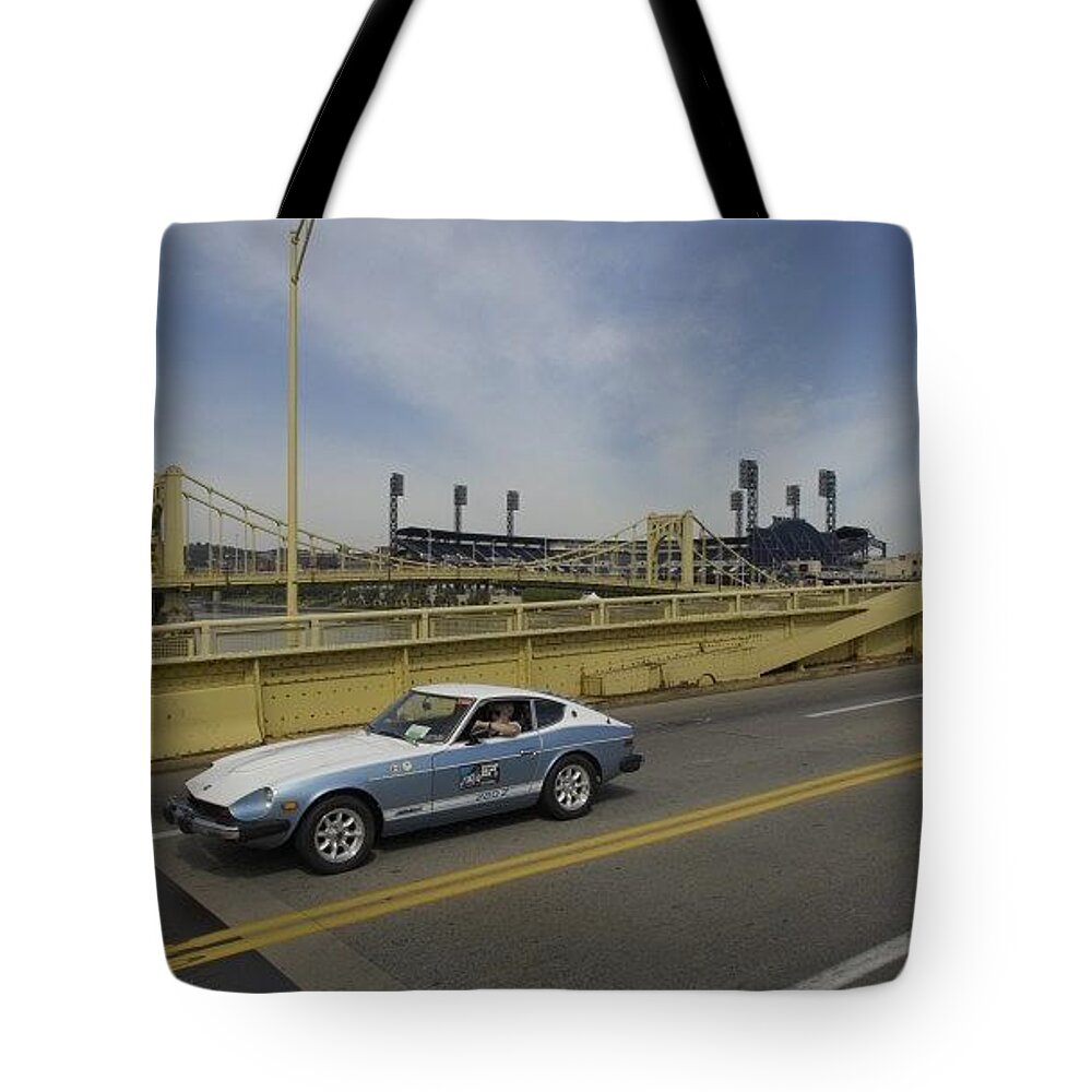 Datsun Tote Bag featuring the photograph Datsun by Mariel Mcmeeking