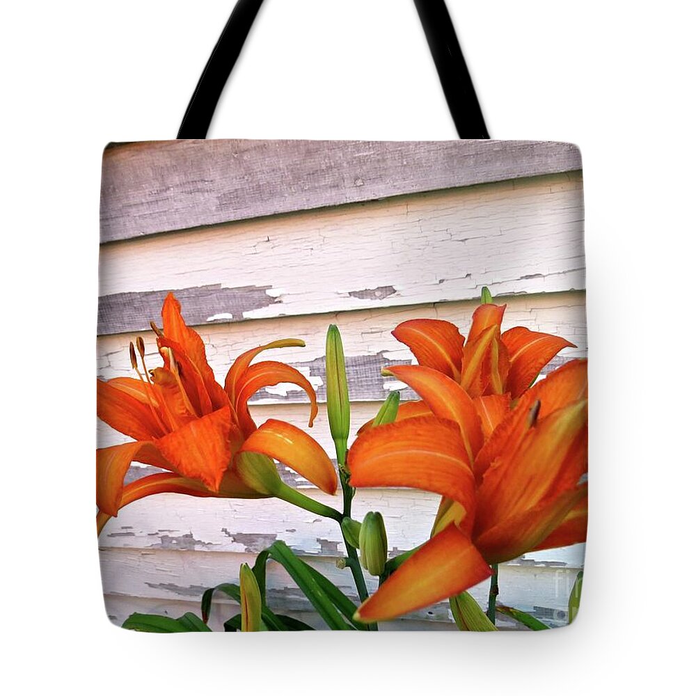 Day Lily Tote Bag featuring the photograph Day Lilies And Peeling Paint by Nancy Patterson