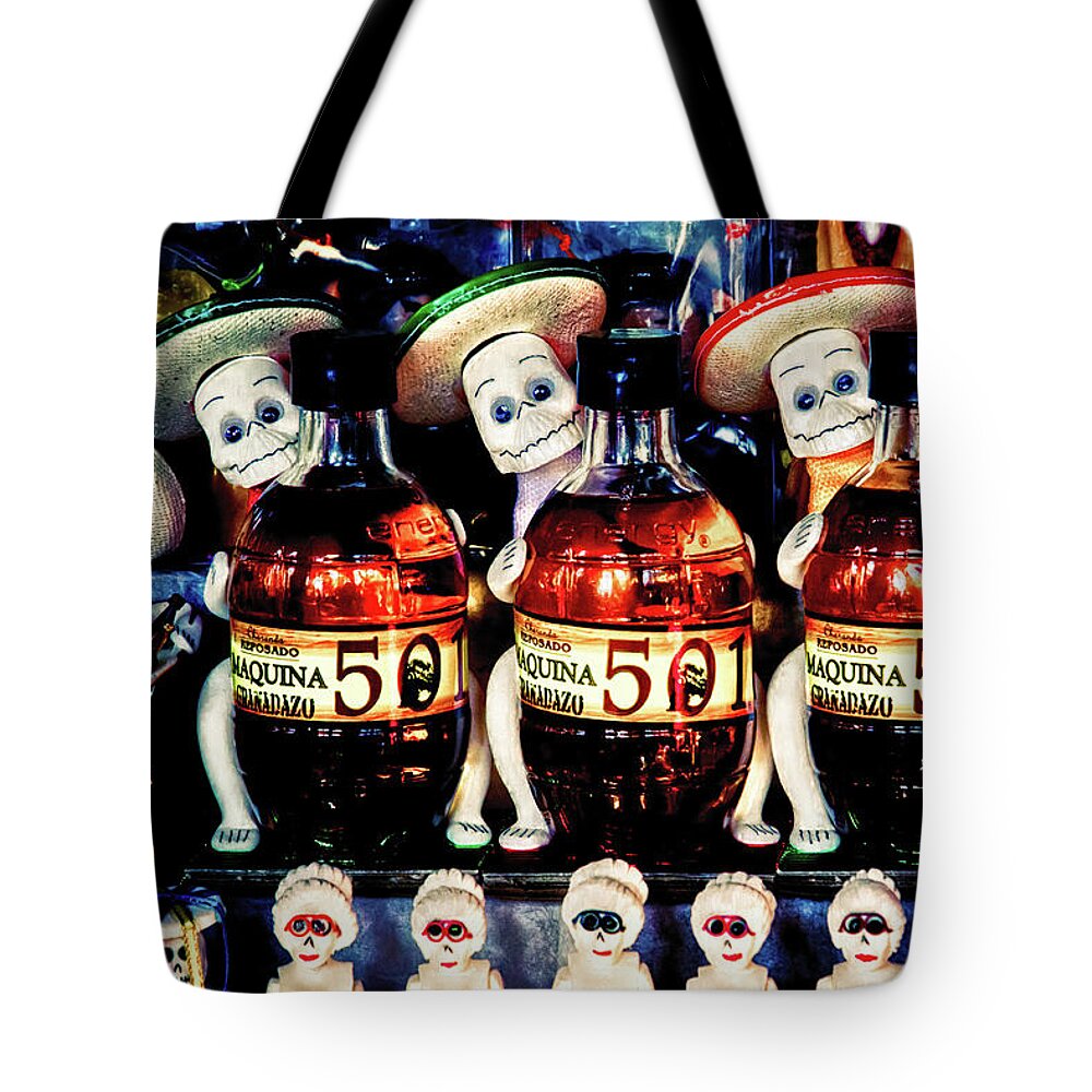 Dia De Los Muertos Tote Bag featuring the photograph Day of the Dead candy and tequila display by Tatiana Travelways
