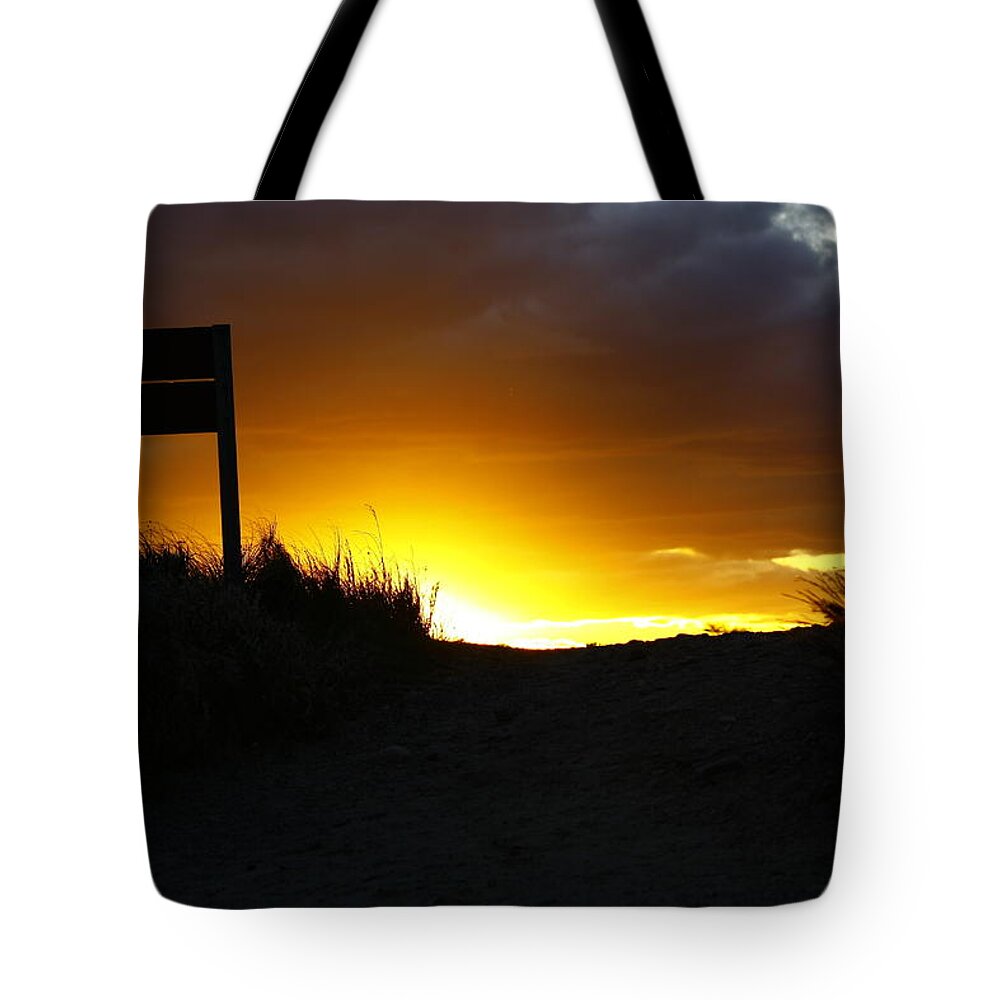 Sunset Tote Bag featuring the photograph Days End by Greg DeBeck