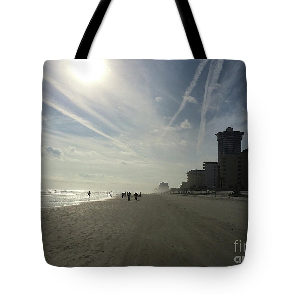 Early Morning Walking The Beach In Daytona Tote Bag featuring the photograph Daytona Beach Early by Audrey Peaty