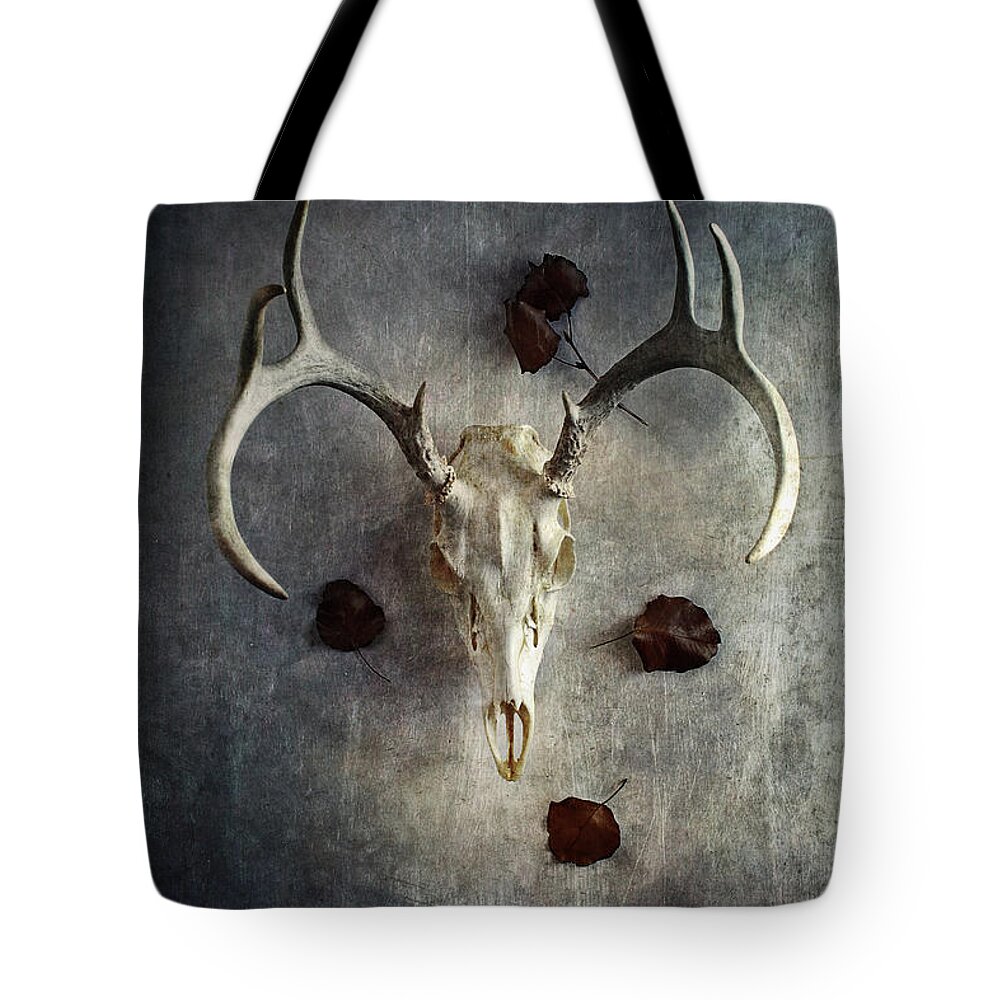 Deer Tote Bag featuring the photograph Deer Buck Skull with Fallen Leaves by Stephanie Frey