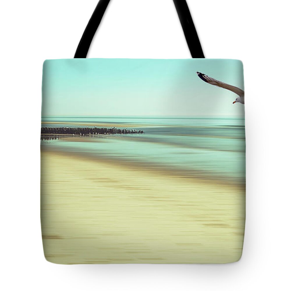 Beach Tote Bag featuring the photograph Desire Light Vintage2 by Hannes Cmarits