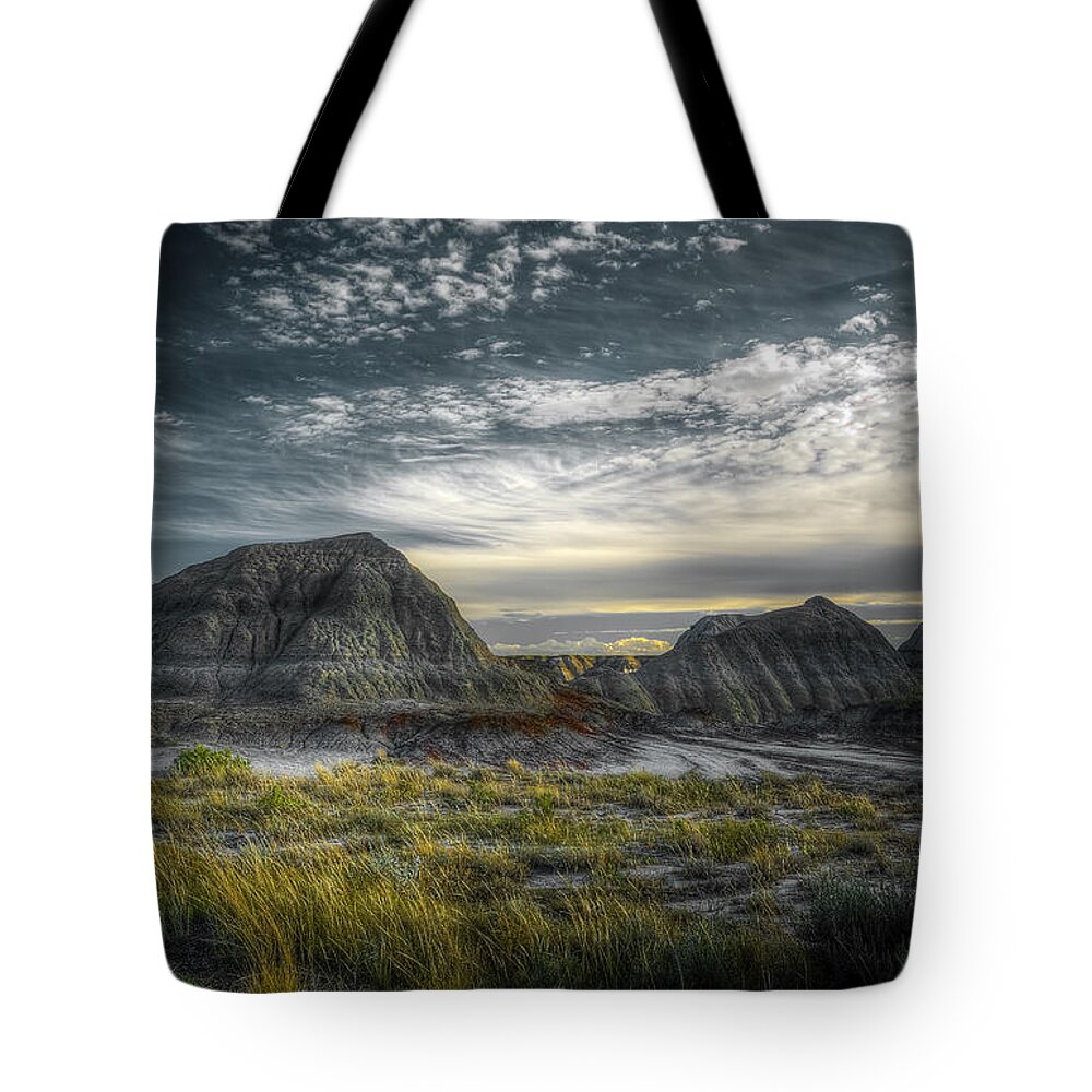 Badlands Tote Bag featuring the photograph Dinosaur Valley by Wayne Sherriff