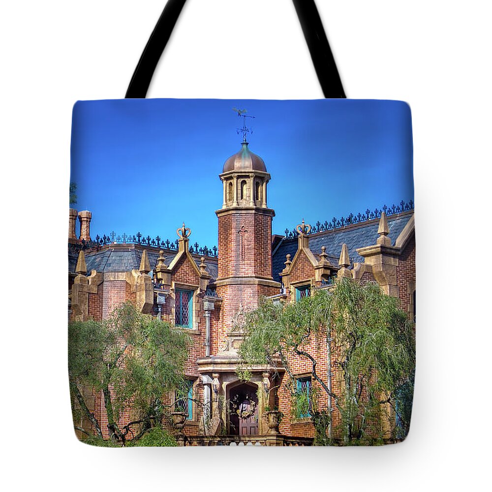 Walt Disney World Tote Bag featuring the photograph Disney World Haunted Mansion by Mark Andrew Thomas