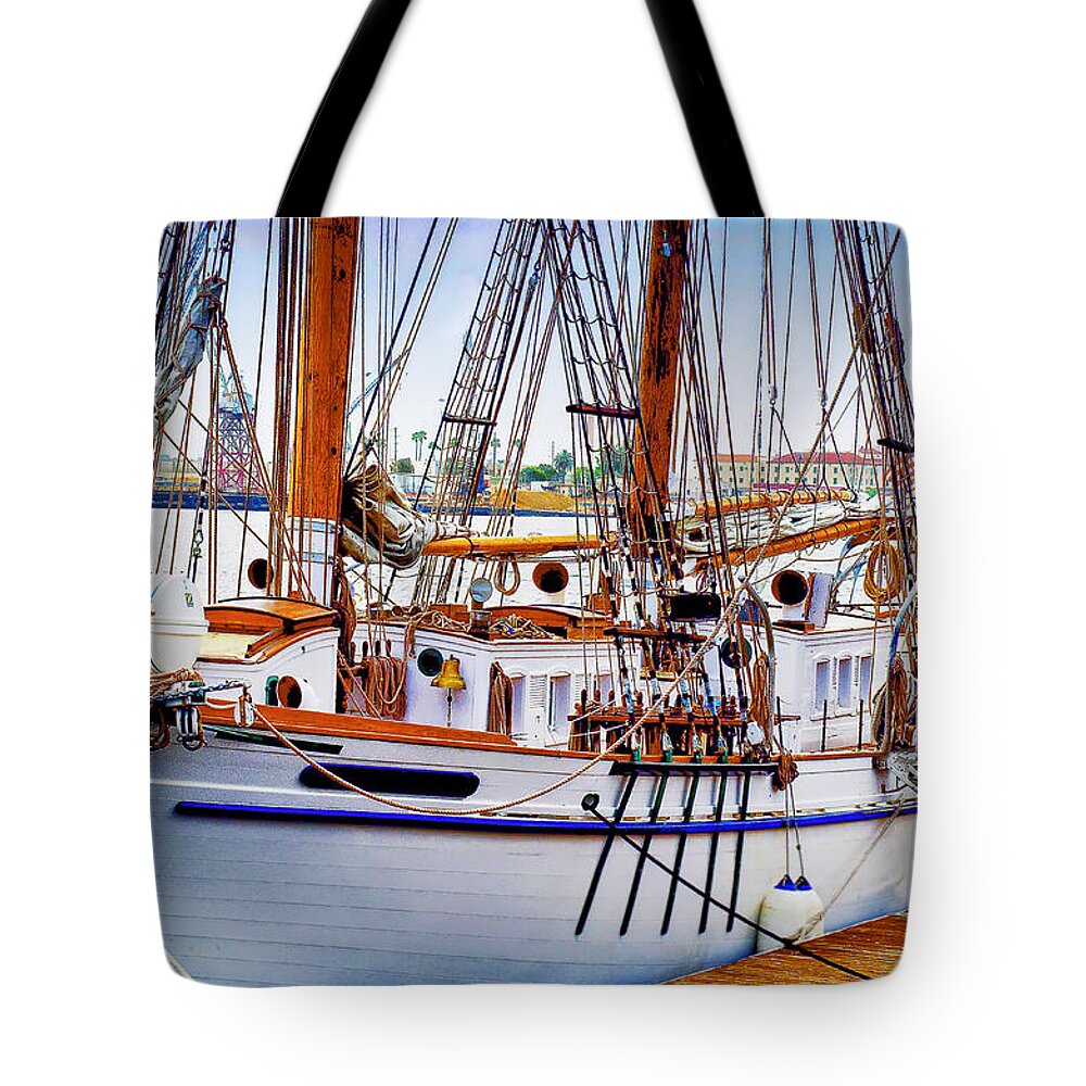 Sailing Tote Bag featuring the photograph Docked by Joseph Hollingsworth