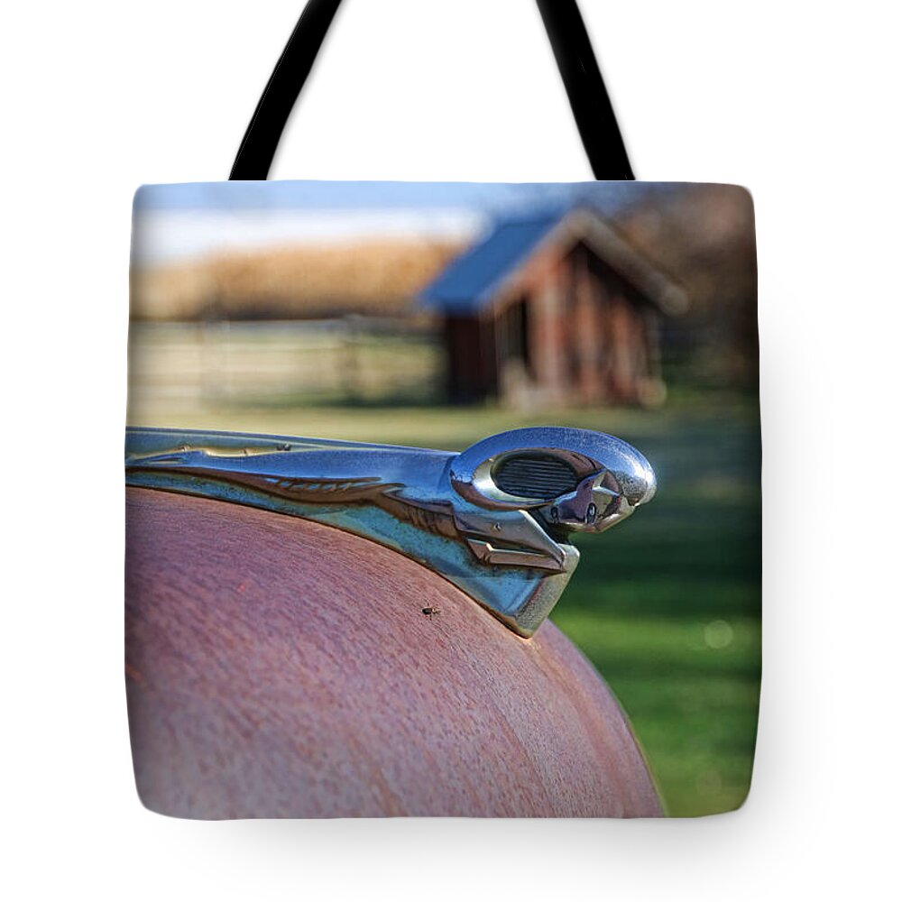 Antelope Island Tote Bag featuring the photograph Dodge Emblem by Ely Arsha