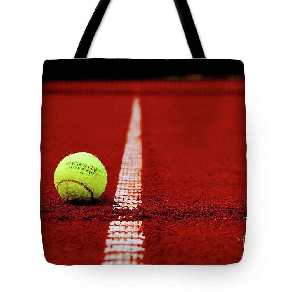 Tennis Tote Bag featuring the photograph Down And Out by Hannes Cmarits
