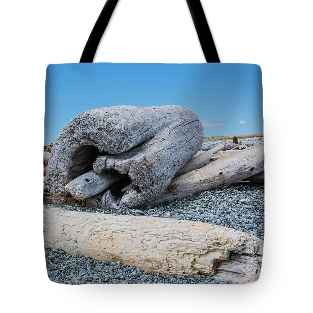 Beach Tote Bag featuring the photograph Driftwood by John Greco