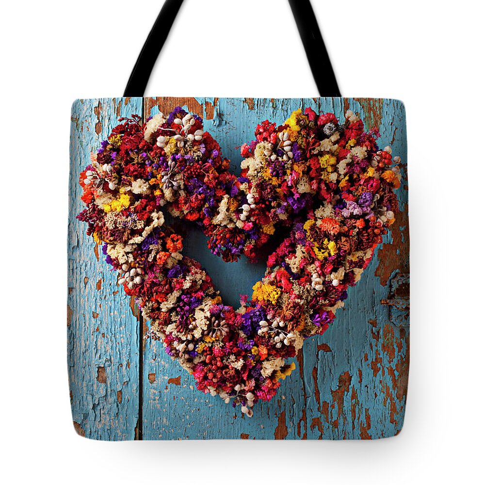 Dry Flower Wreath Tote Bag featuring the photograph Dry flower wreath on blue door by Garry Gay