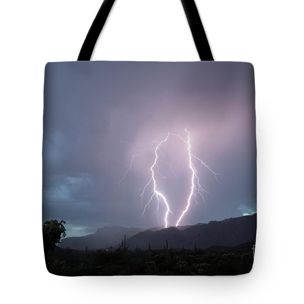 Lightning Tote Bag featuring the photograph Dual Lightning Strike Superstition Mountains by Joanne West