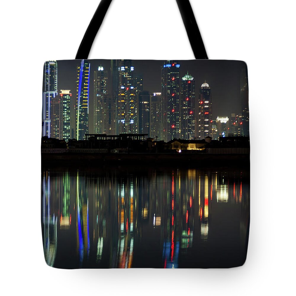 Dubai Tote Bag featuring the photograph Dubai city skyline nighttime by Andy Myatt
