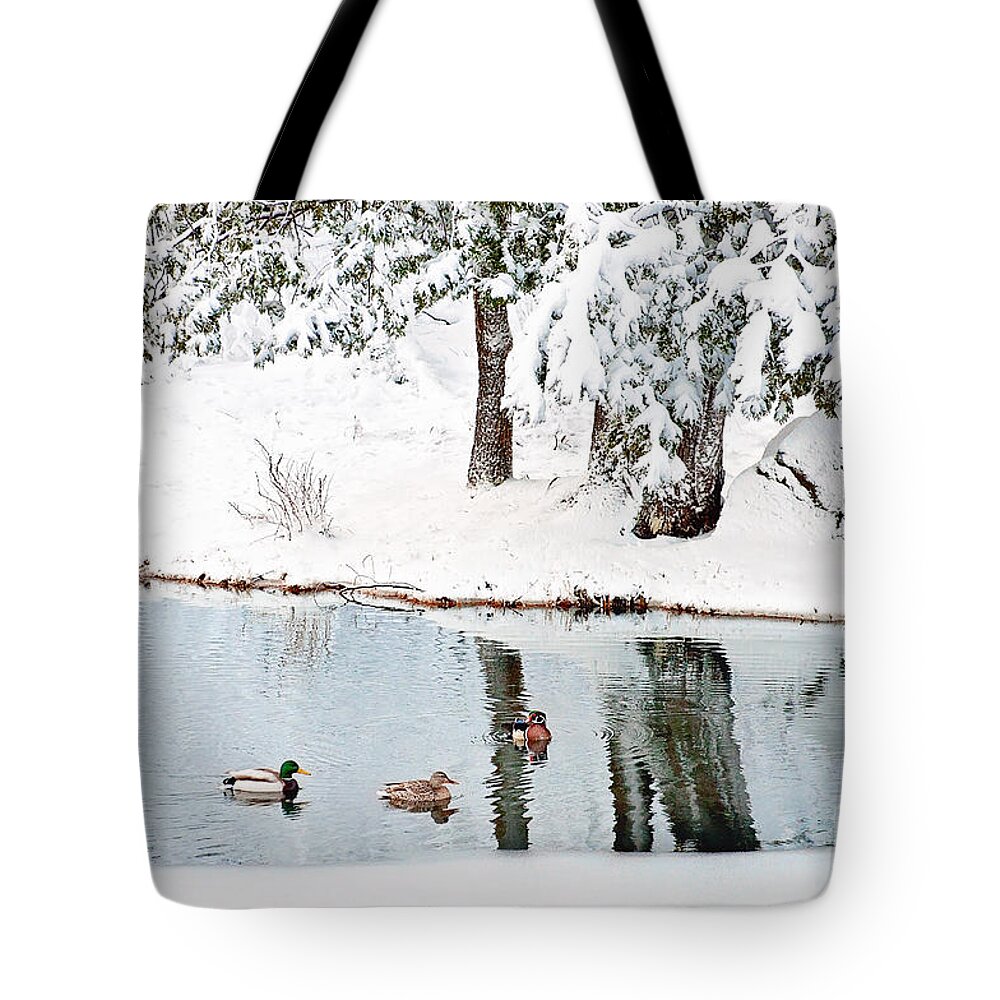 Ducks On The Pond Tote Bag featuring the photograph Ducks on the Pond by Gwen Gibson