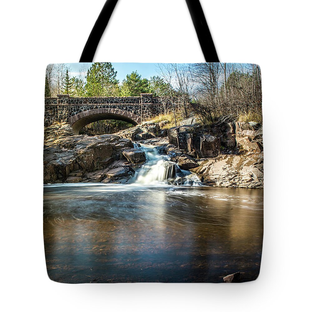 One Of Seven Bridges Tote Bag featuring the photograph Duluth Bridge by Paul Freidlund