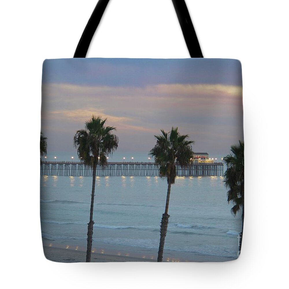 Oceanside Tote Bag featuring the photograph Dusk at the Pier by Suzanne Oesterling