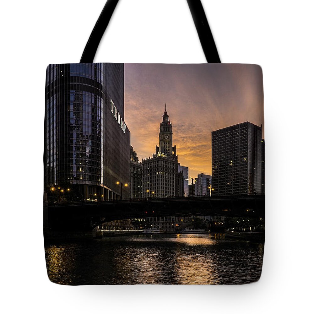 Chicago River Tote Bag featuring the photograph early morning orange sky on the Chicago Riverwalk by Sven Brogren