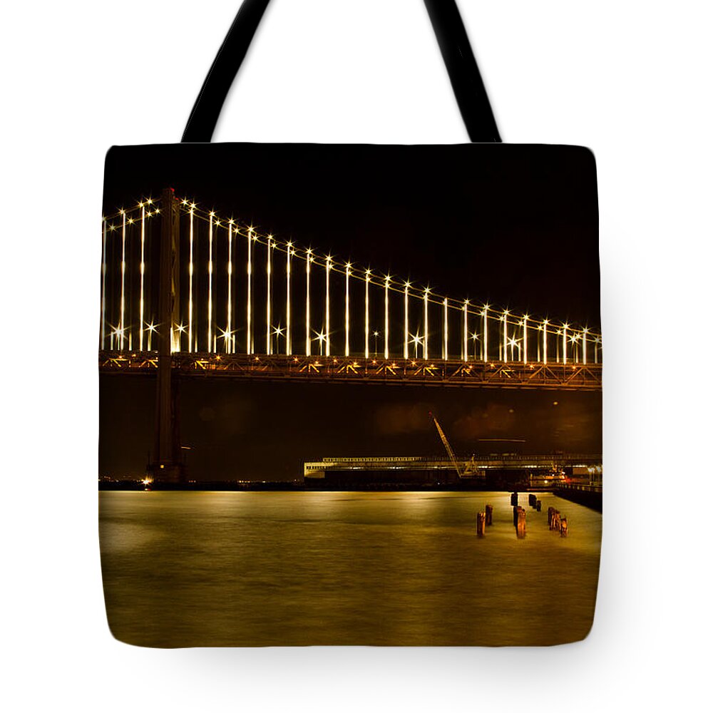 Edge Of The Waterfront Tote Bag featuring the photograph Edge of the Waterfront by Bonnie Follett