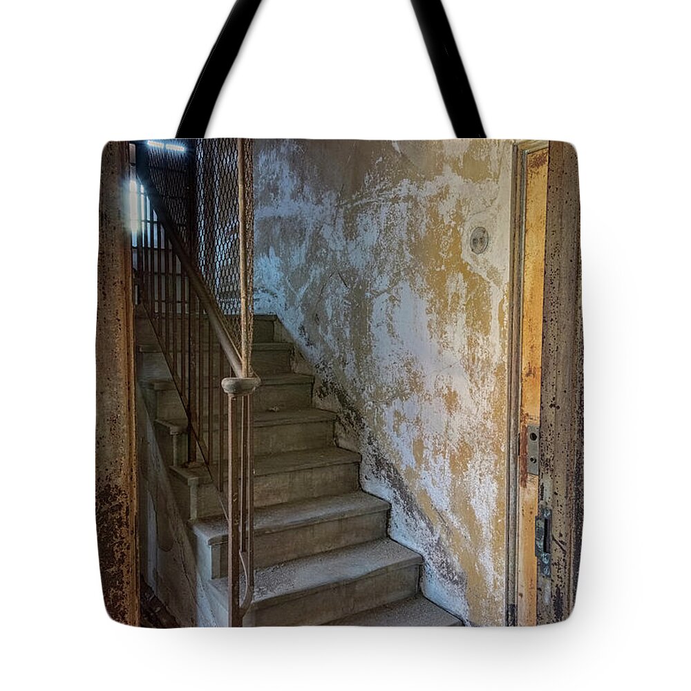 Jersey City New Jersey Tote Bag featuring the photograph Ellis Island Stairs by Tom Singleton