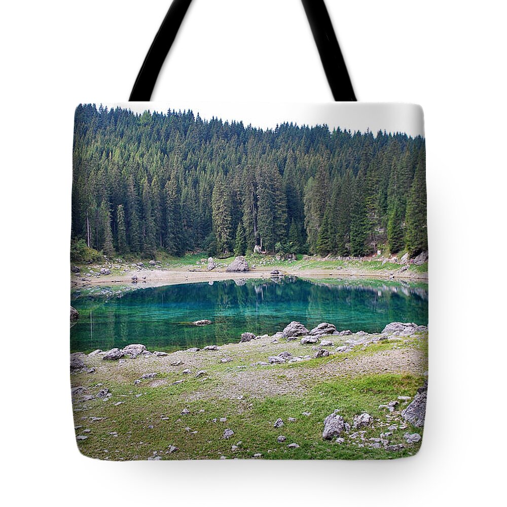 Nova Levante Tote Bag featuring the photograph Emerald Lake by Fabio Caironi