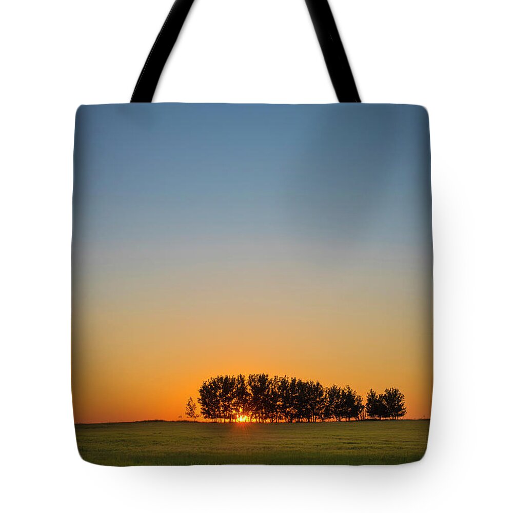 Sunset Tote Bag featuring the photograph End of the Day by Bill Cubitt