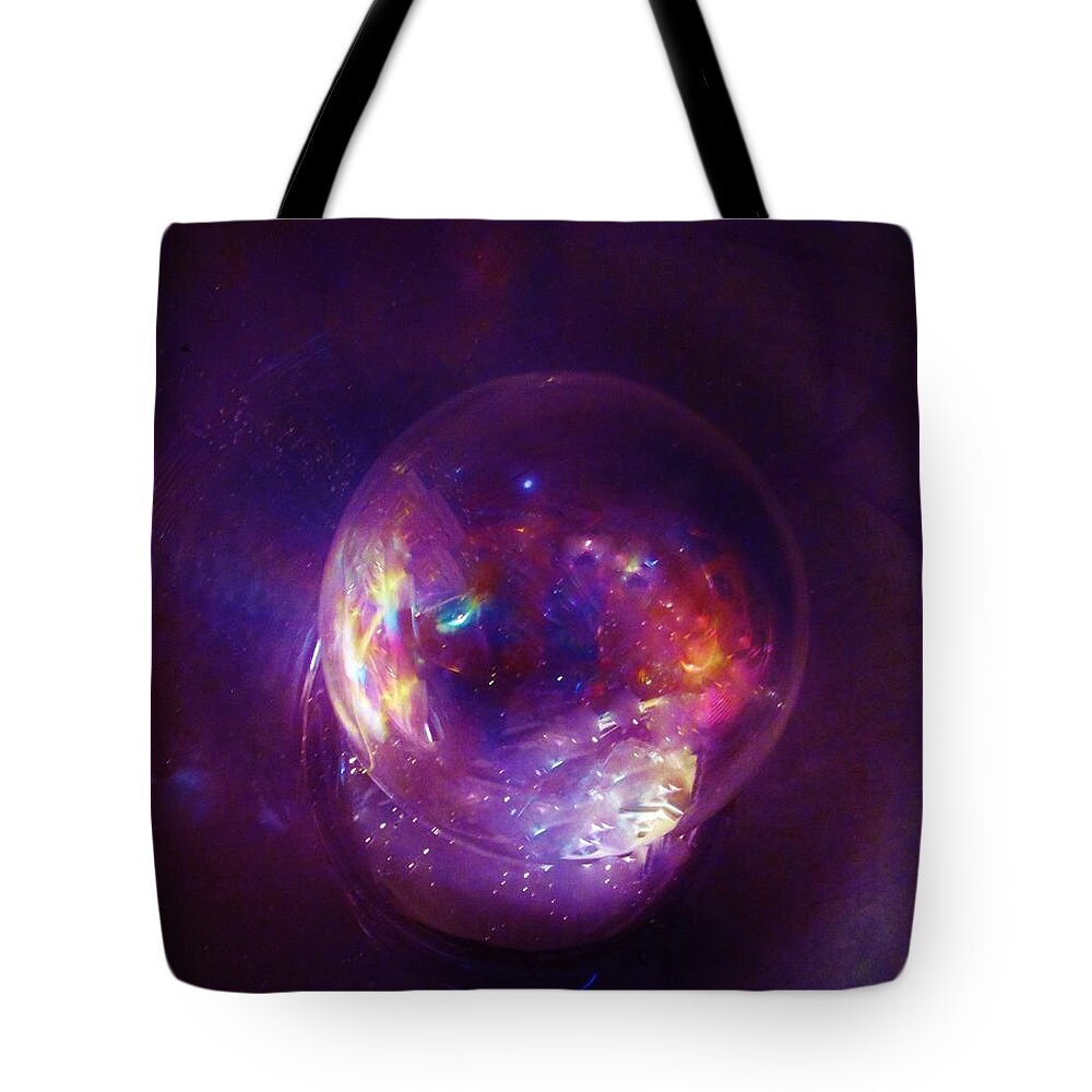 Planet Tote Bag featuring the photograph Entering A Wormhole by Sharon Ackley