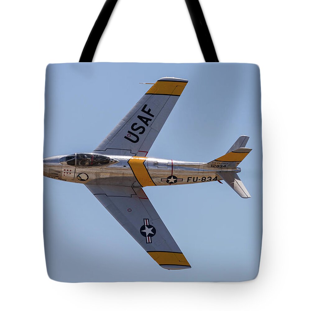 F-86 Tote Bag featuring the photograph F-86 Jolley Roger by John Daly