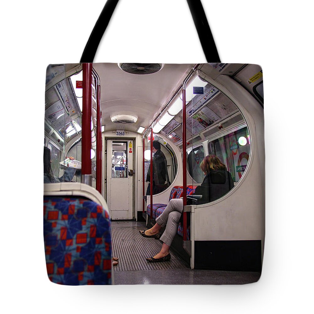 London Underground Tube Uk Britain England Strangers Faceless Riding Train Lambeth North Tote Bag featuring the photograph Faceless Strangers by Ross Henton