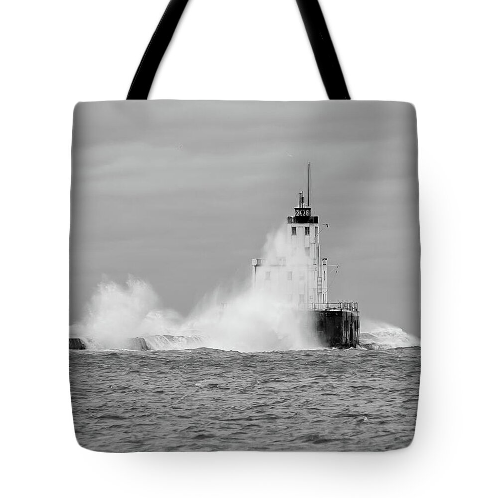 Breakwater Lighthouse Tote Bag featuring the photograph Fall Storm II by Paul Schultz
