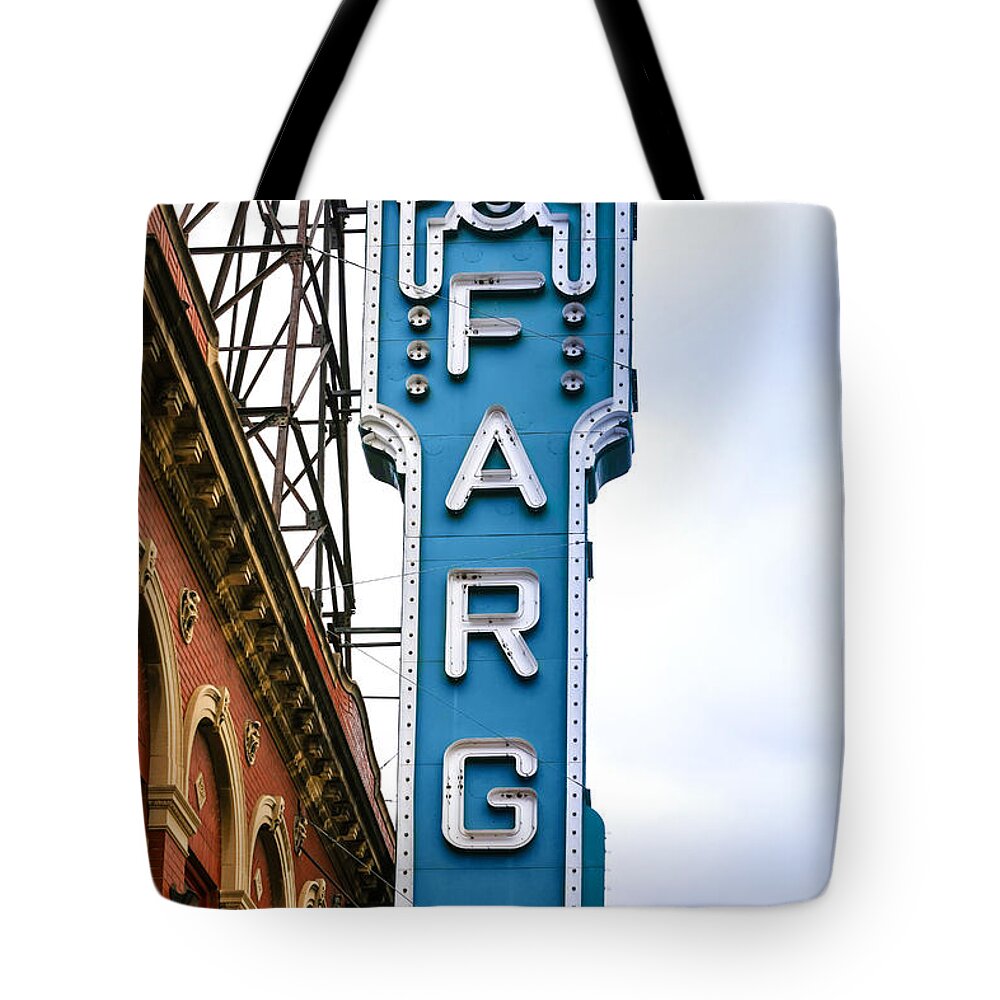 Fargo; Cinema; Blue; Overhead; Sign; City; Theater; Movie-house; Big; Screen; Film; Flicks; Motion; Pictures; Movies; Theater; Picture-show; Playhouse; Silver-screen; Centre; Performing; Arts; Hall; Locale; Site; Entertainment; Attraction; Recreation; Leisure; Lifestyles; Building; Architecture; Landmark; Nd; North; Dakota; America; Usa; Tote Bag featuring the photograph Fargo Blue Theater Sign by Chris Smith