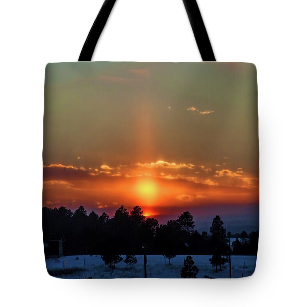Sunset Tote Bag featuring the photograph February Sunset by Alana Thrower