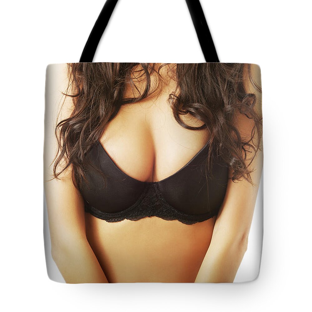 Female boobs in black bra Tote Bag by Piotr Marcinski - Pixels