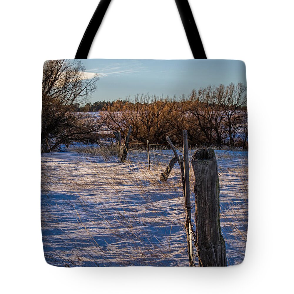 Snow Tote Bag featuring the photograph Fence Line by Alana Thrower