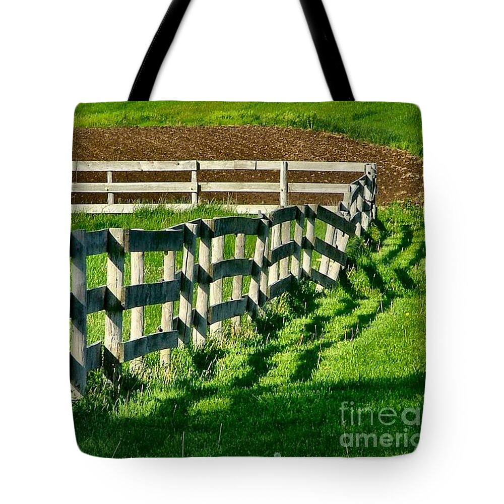 Fences Tote Bag featuring the photograph Fences and Shadows by Julie Dant