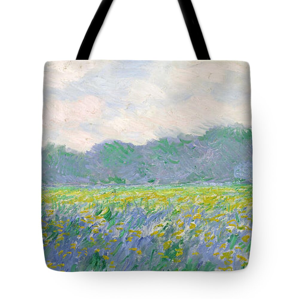 Field Tote Bag featuring the painting Field of Yellow Irises at Giverny by Claude Monet