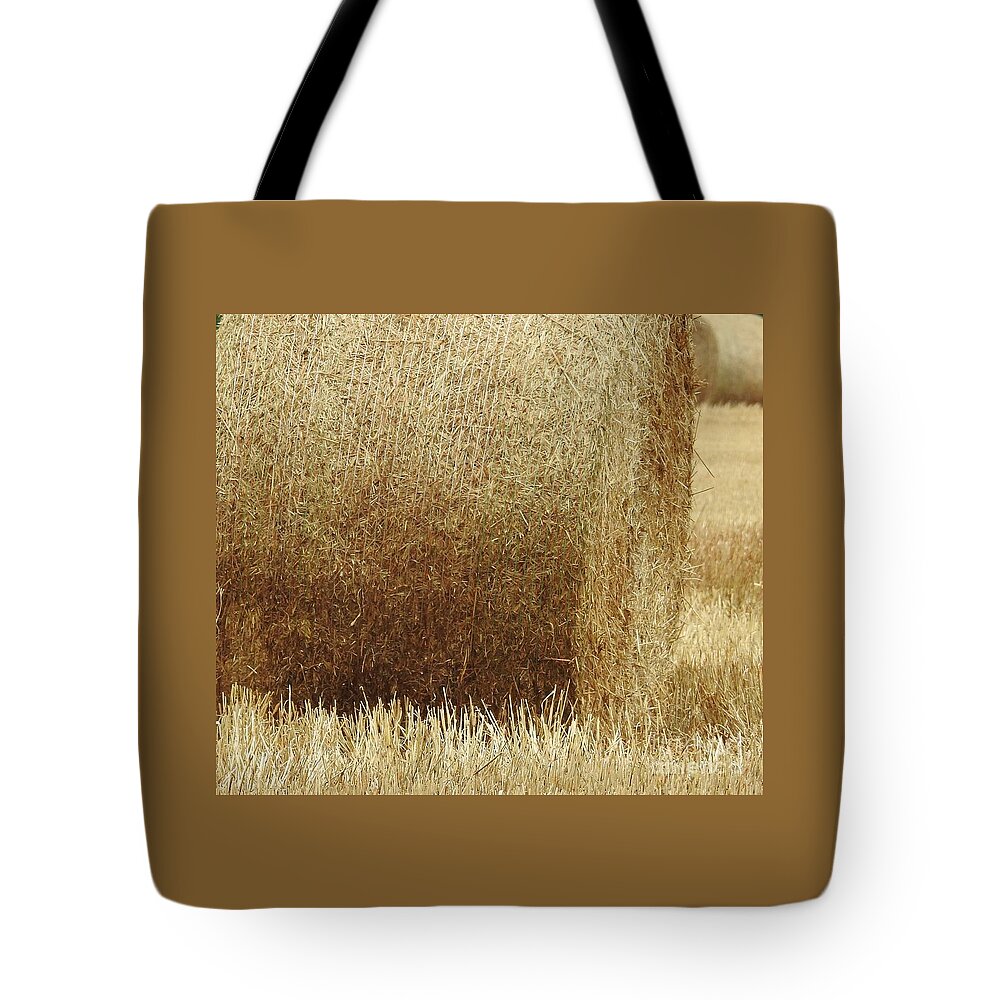Hay Tote Bag featuring the photograph Fields Of Hay by Jan Gelders