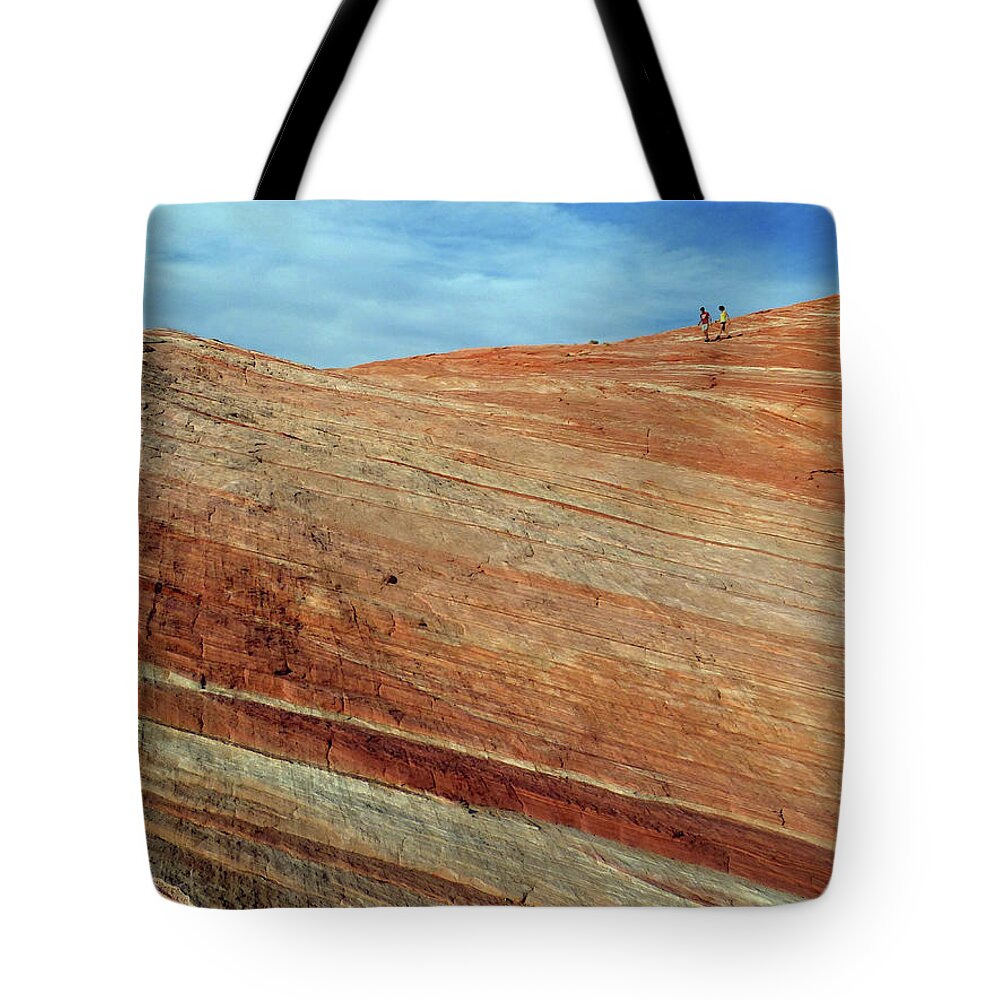 Fire Wave Tote Bag featuring the photograph Fire Wave Hikers by JustJeffAz Photography