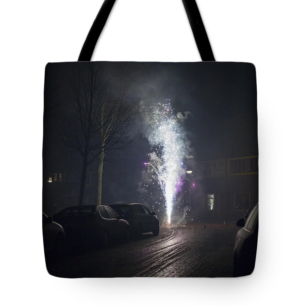 Works Tote Bag featuring the photograph Fireworks in the street by Patricia Hofmeester