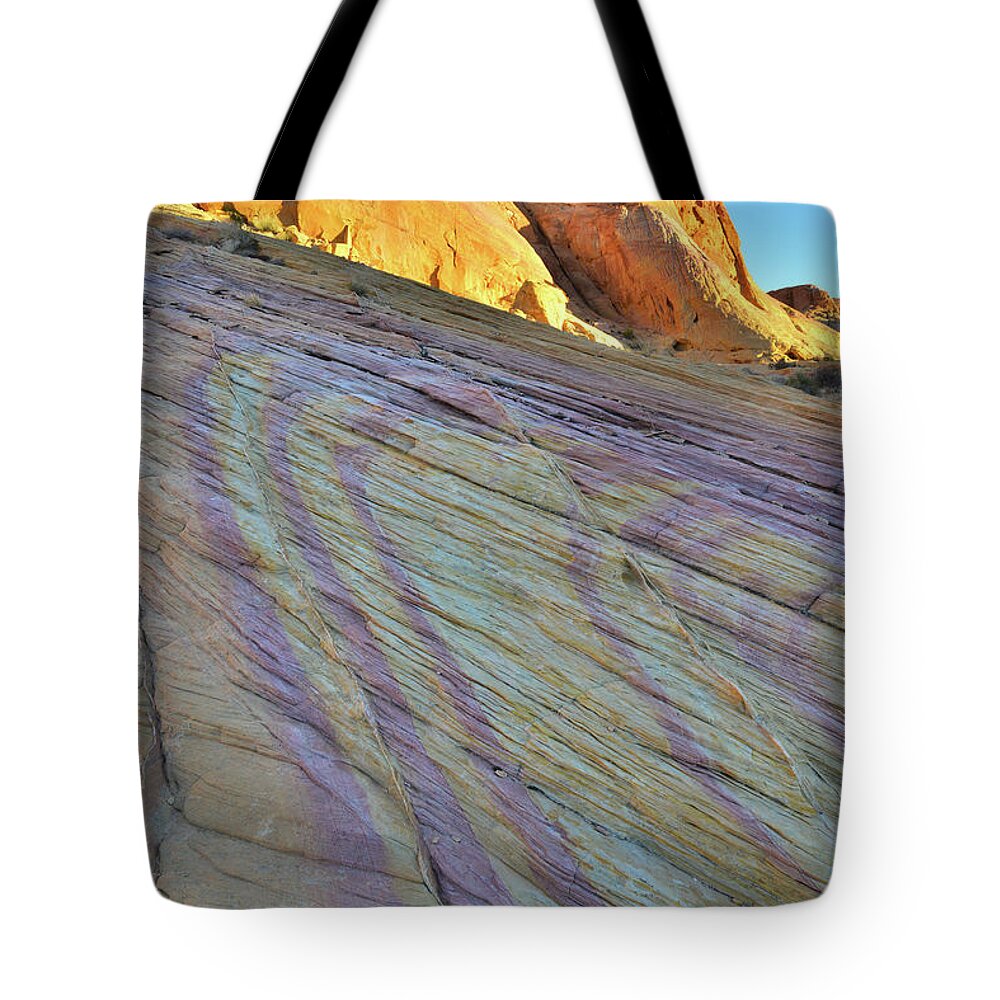 Valley Of Fire State Park Tote Bag featuring the photograph First Light on Colorful Valley of Fire by Ray Mathis