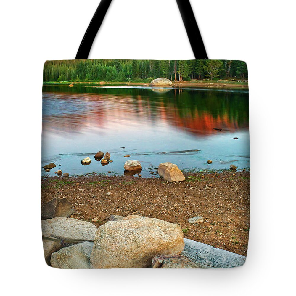 Brainard Lake Tote Bag featuring the photograph First Light On The Shores by John De Bord