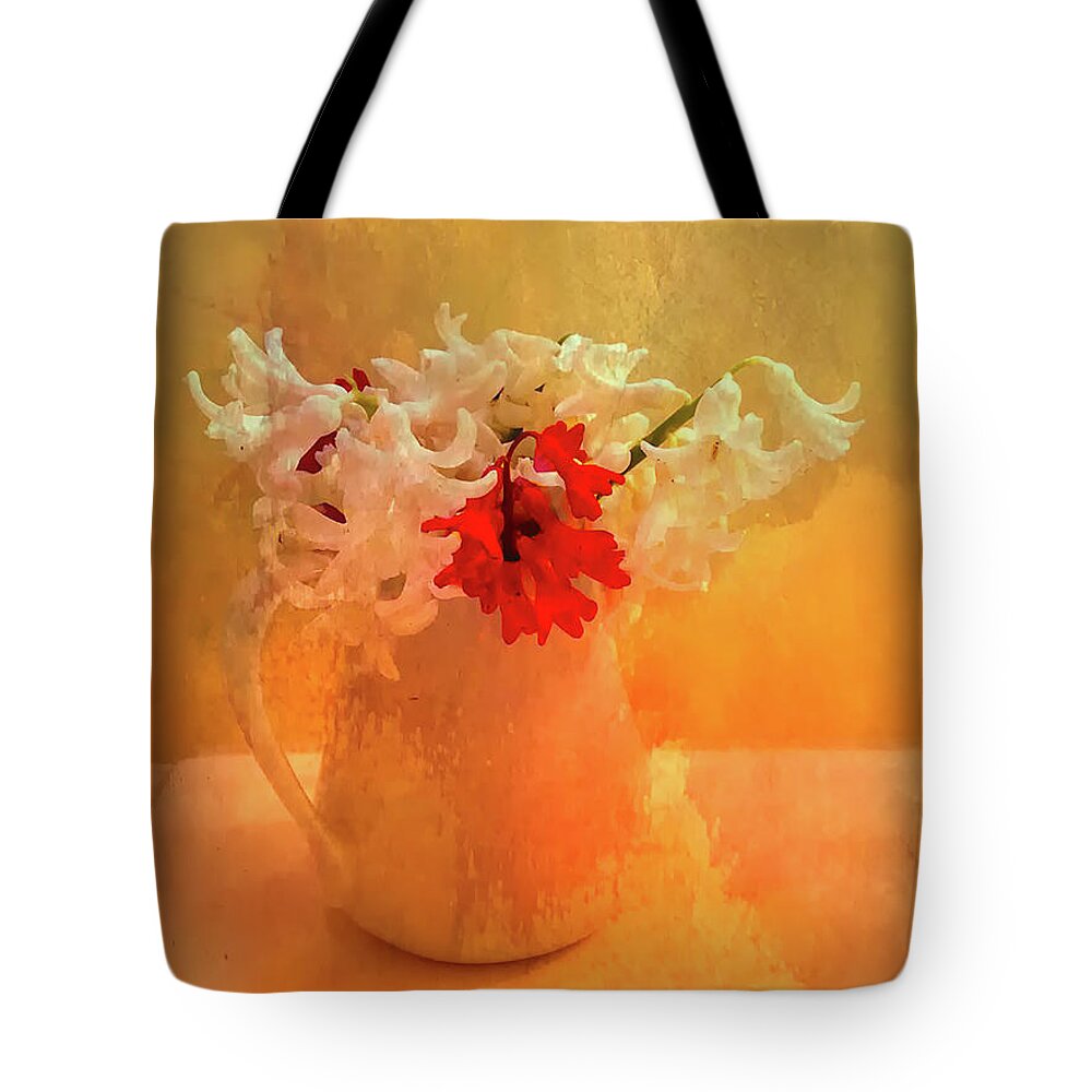 Flowers Tote Bag featuring the photograph First of Spring by Peggy Dietz