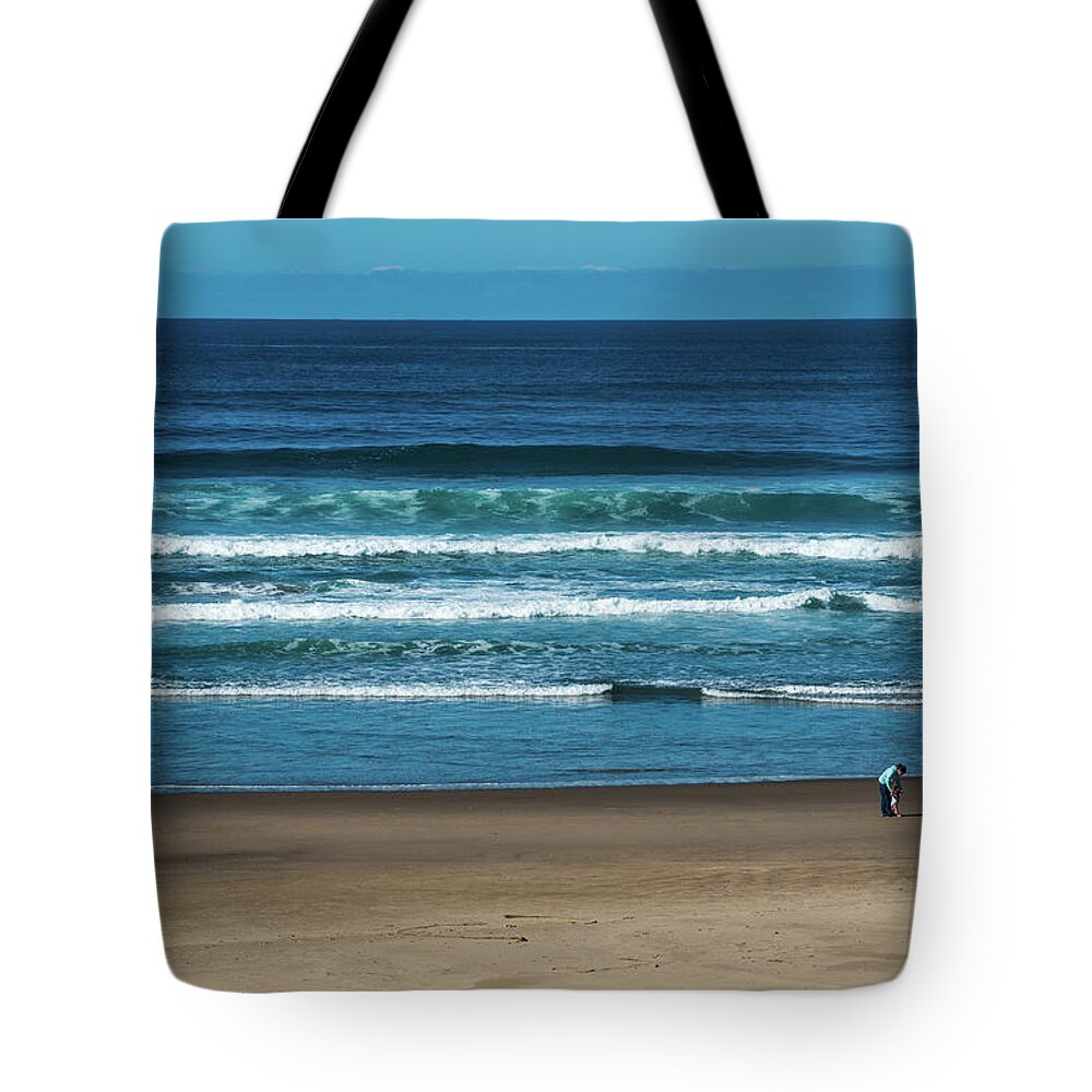 Oregon Tote Bag featuring the photograph First Steps on the Sand by Tom Cochran