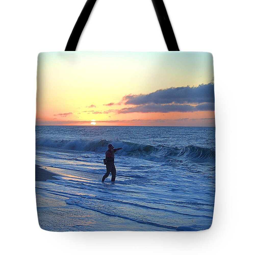 Surfcasting Tote Bag featuring the photograph Fisherman by Newwwman
