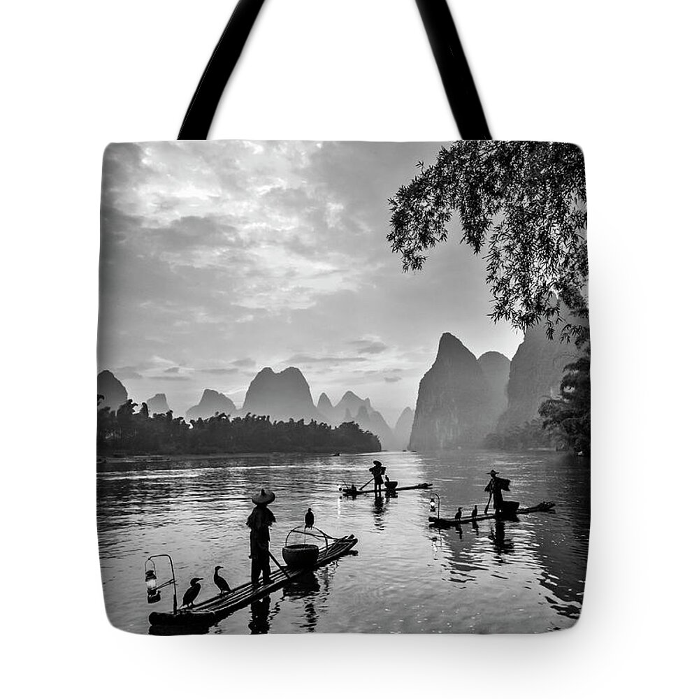China Tote Bag featuring the photograph Fishermen at dawn. by Usha Peddamatham