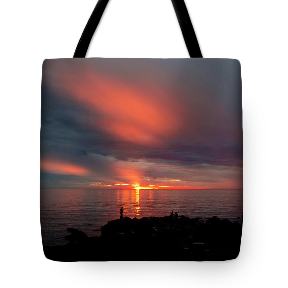 Sunset Tote Bag featuring the photograph Fishing at Sunset in Piriapolis, Uruguay by Venetia Featherstone-Witty
