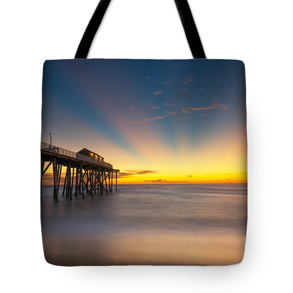 Fishing Pier Sunrise Tote Bag featuring the photograph Fishing Pier Sun Rays by Michael Ver Sprill