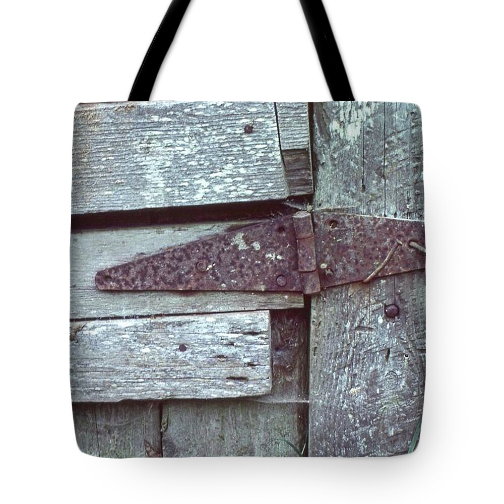 Farm Weathered Wood Hinge Repair Fix Tote Bag featuring the photograph Fixed by Laurie Stewart