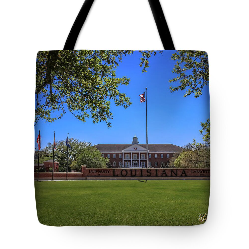 Ul Tote Bag featuring the photograph Flag at Entrance by Gregory Daley MPSA