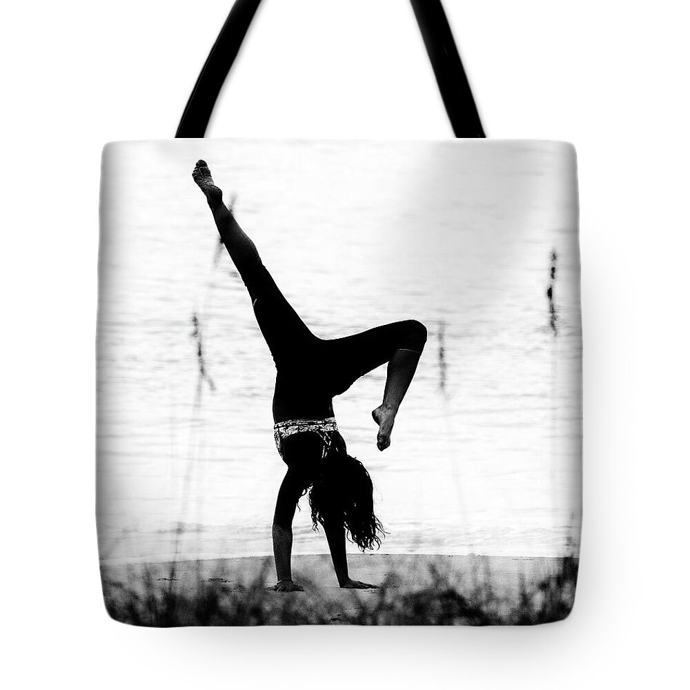 Beach Tote Bag featuring the photograph Flexible by Alan Raasch