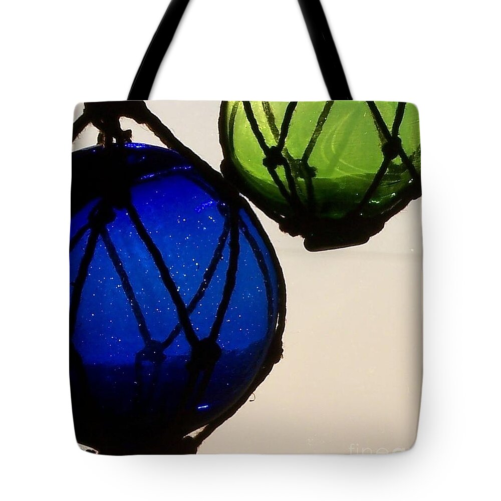 Glass Floats Tote Bag featuring the photograph Floats by Jackie Mueller-Jones